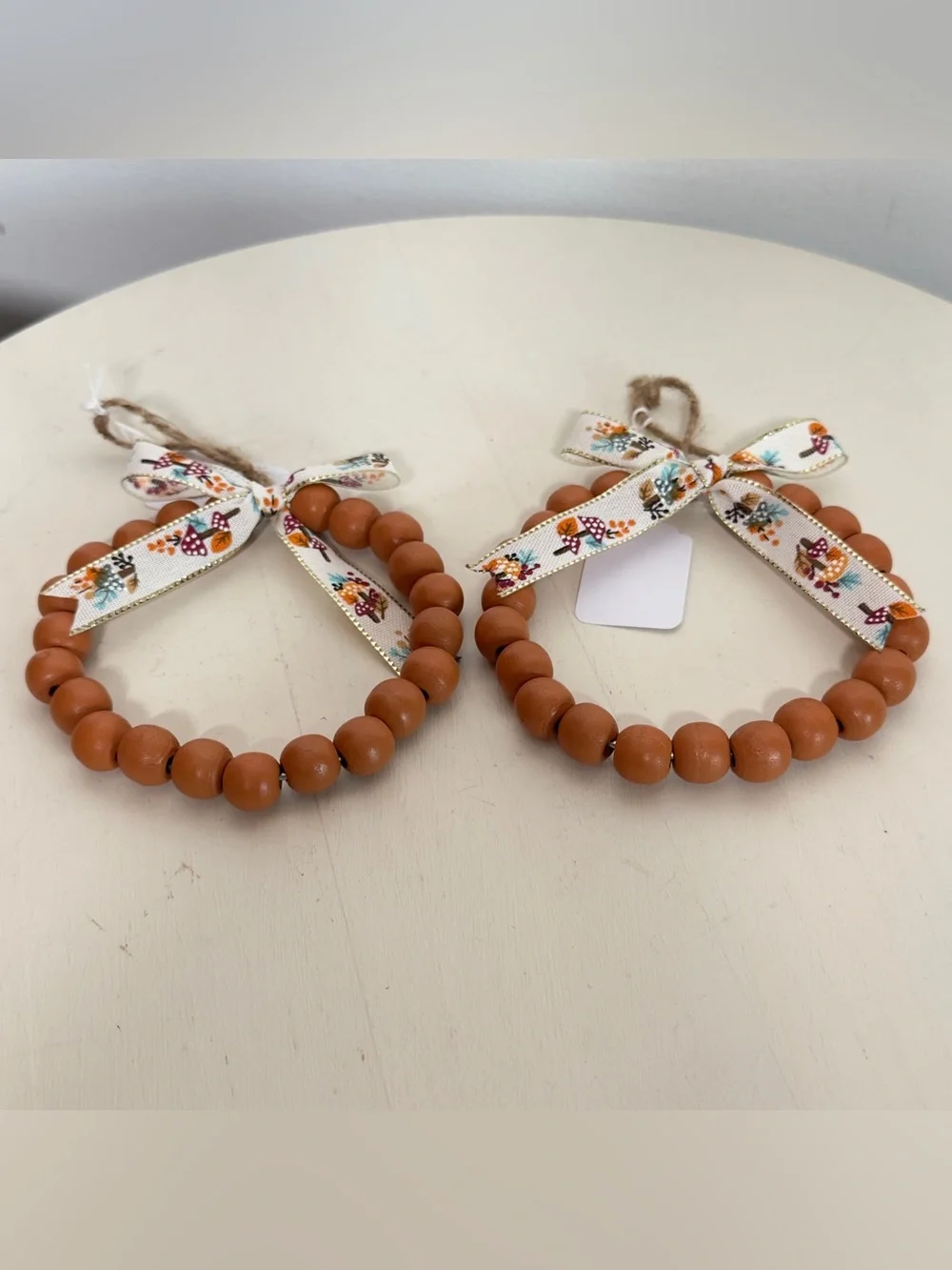 2 Handmade Wood Beaded Ornament With Mushroom Print Bow